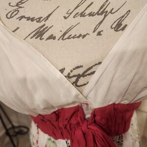 Chic White Dress with Red Sash